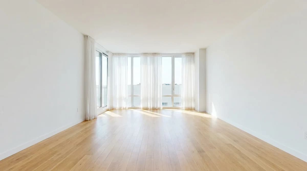 Photo d'un salon vide et non meublé importée par un client